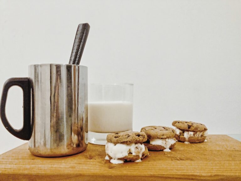 stainless steel cup with white liquid inside