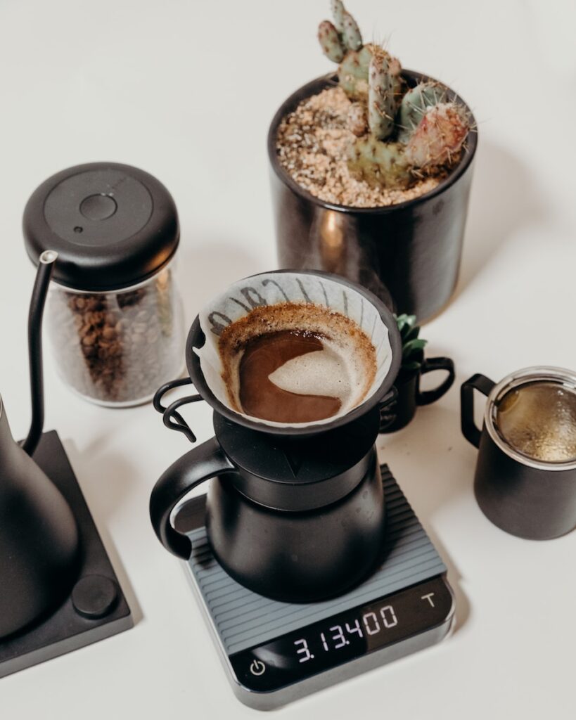 black ceramic mug on black saucer